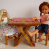 table pliante poupées présentée avec ses 2 chaises